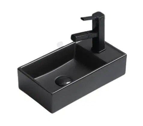 Modern zwarte badkamer wastafel met bijpassende kranen, perfect voor een strakke en stijlvolle badkamer inrichting.